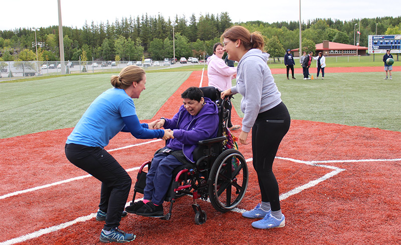 Three women at an athletic event